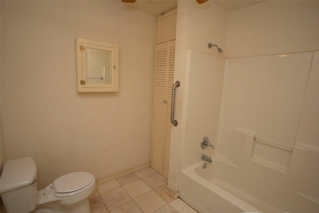 bathroom featuring tile patterned floors,  shower combination, and toilet