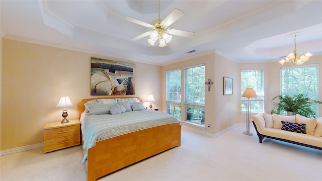 bedroom with a raised ceiling, crown molding, and ceiling fan with notable chandelier