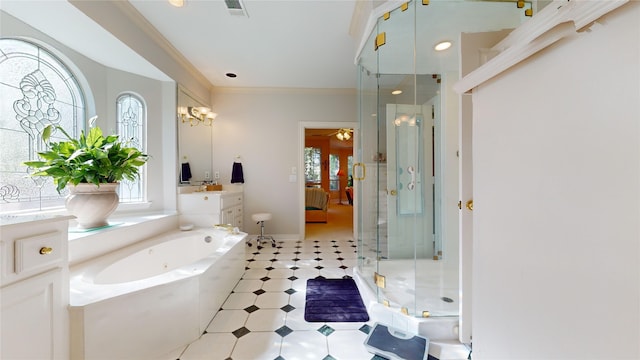 bathroom featuring vanity, crown molding, independent shower and bath, and an inviting chandelier