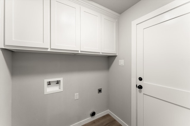 laundry area with washer hookup, electric dryer hookup, cabinets, and wood-type flooring