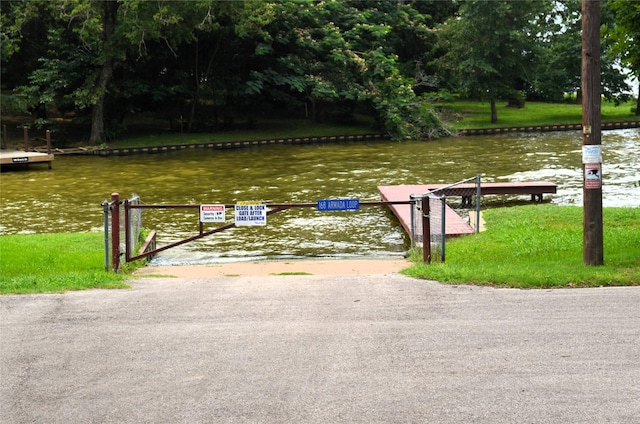 view of home's community featuring a water view