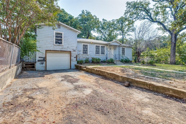 view of front of home with a garage