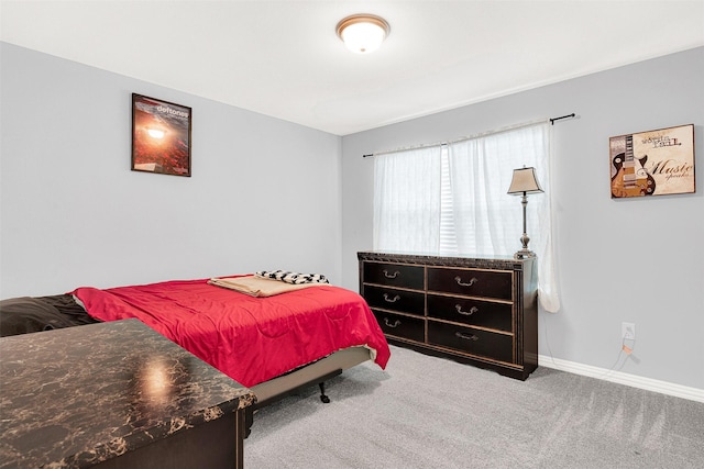 bedroom featuring carpet