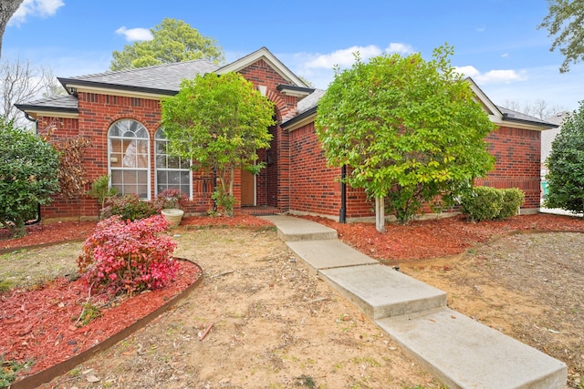 view of property hidden behind natural elements