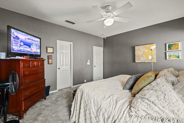 bedroom with ceiling fan and light colored carpet