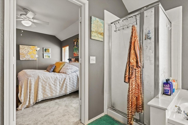 bedroom featuring ceiling fan, carpet flooring, and vaulted ceiling