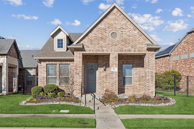 view of front facade with a front lawn