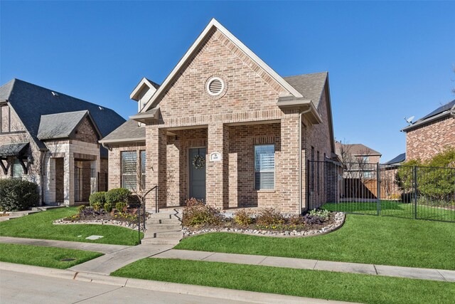 view of front of property with a front lawn