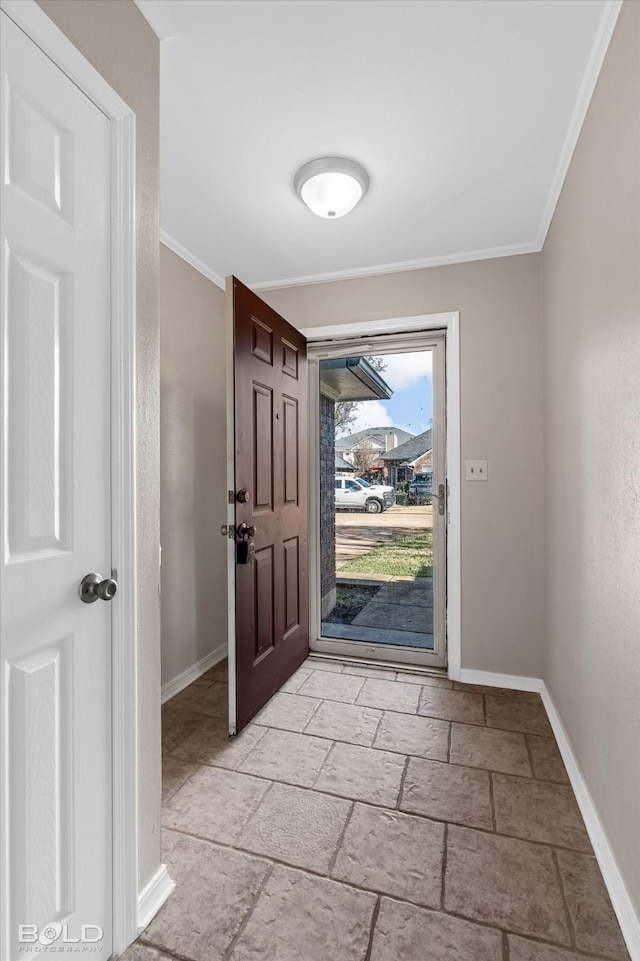 entrance foyer featuring ornamental molding