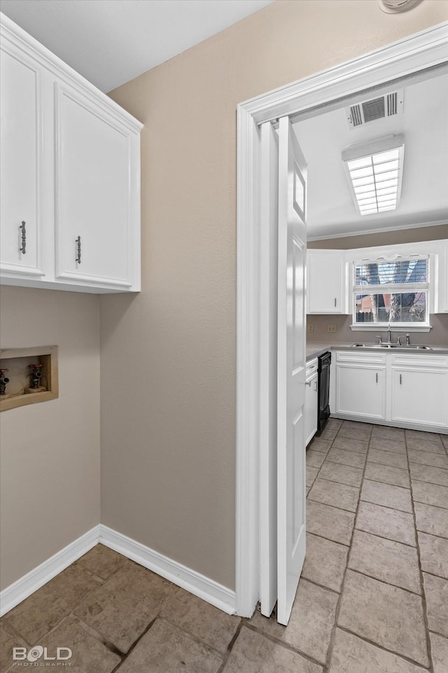 washroom with sink and washer hookup