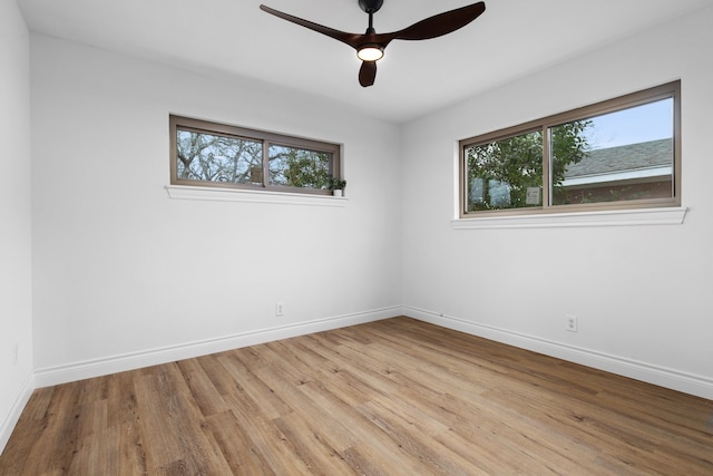 unfurnished room featuring ceiling fan and light hardwood / wood-style flooring