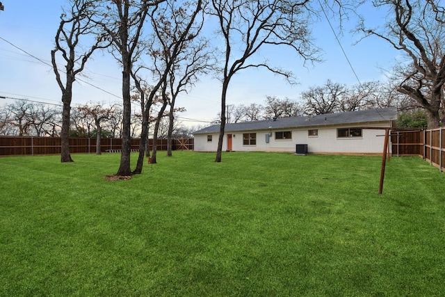 view of yard with central air condition unit