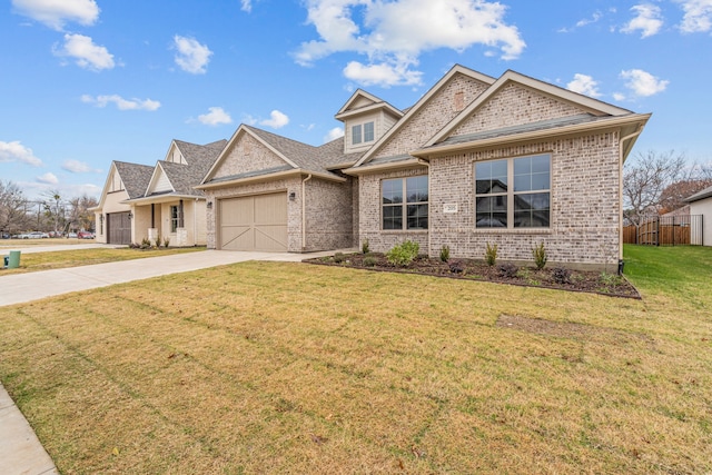 craftsman house featuring a garage and a front lawn