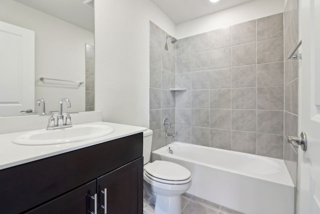 full bathroom with tiled shower / bath combo, vanity, tile patterned flooring, and toilet