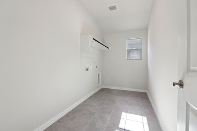 clothes washing area with hookup for a gas dryer, hookup for an electric dryer, light tile patterned floors, and hookup for a washing machine