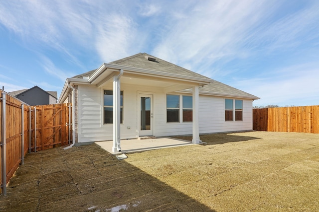 back of house featuring a patio area