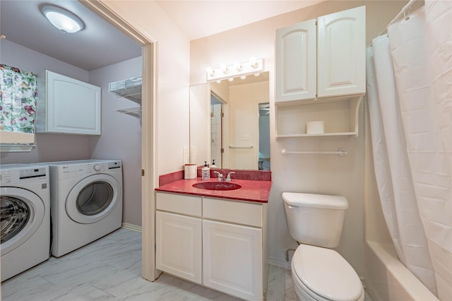 full bathroom with separate washer and dryer, vanity, shower / tub combo, and toilet