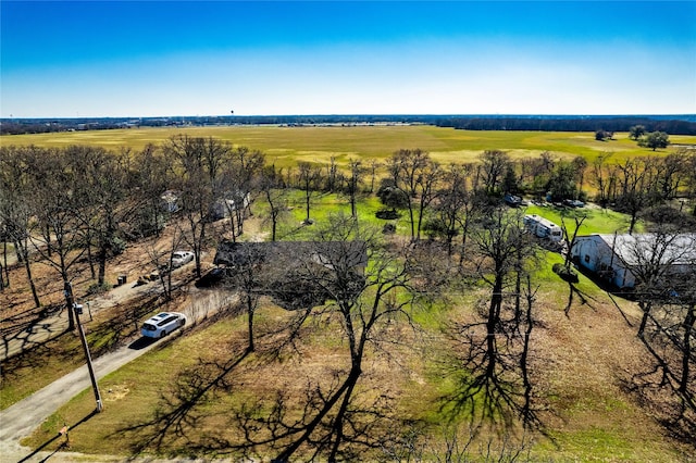 birds eye view of property with a rural view