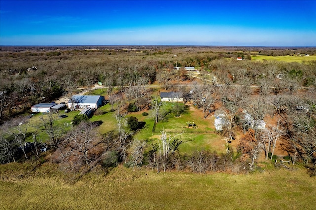 birds eye view of property featuring a rural view