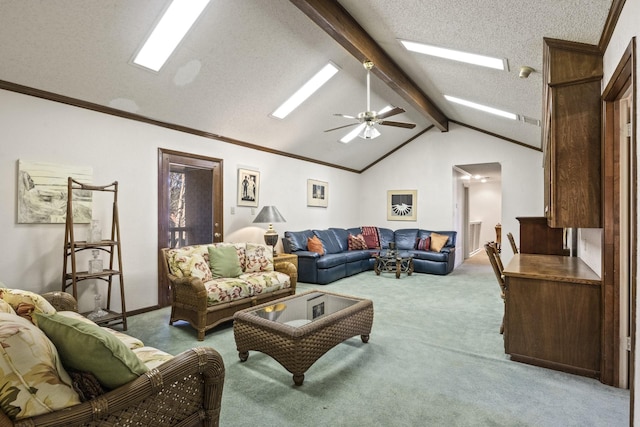 carpeted living room with crown molding, ceiling fan, a textured ceiling, and vaulted ceiling with beams