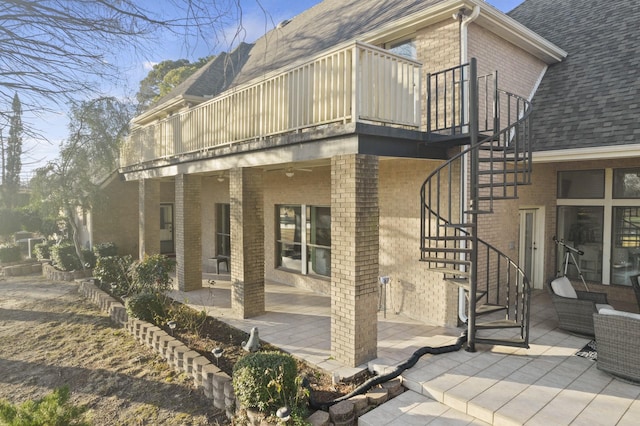 exterior space featuring a patio area and a balcony