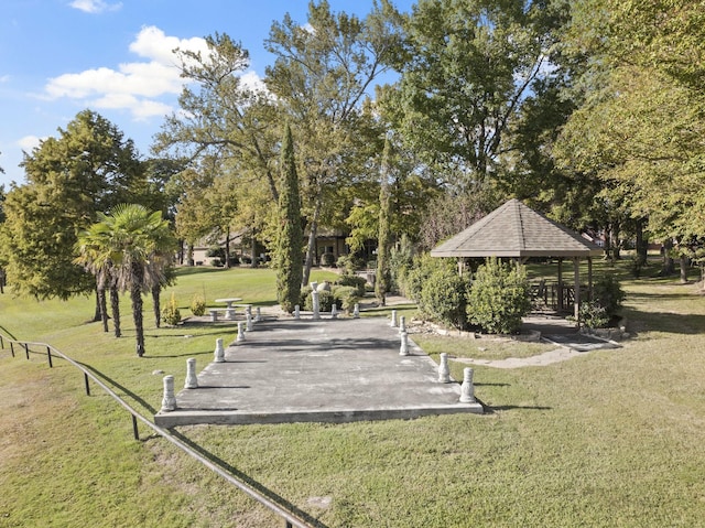 view of home's community featuring a gazebo and a yard