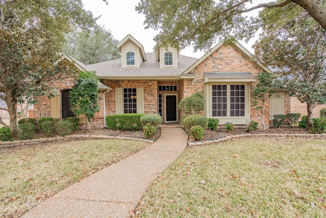 view of front of property with a front lawn