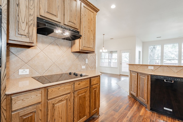 kitchen featuring decorative light fixtures, black appliances, decorative backsplash, dark hardwood / wood-style flooring, and a chandelier