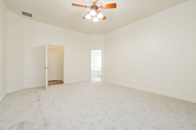 carpeted empty room with ceiling fan