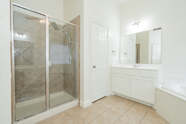 bathroom with vanity, separate shower and tub, and tile patterned flooring