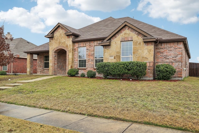 view of front of home featuring a front lawn