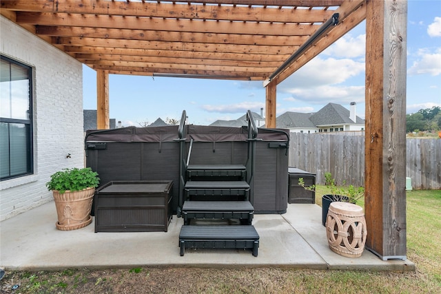 view of patio with a pergola and a hot tub