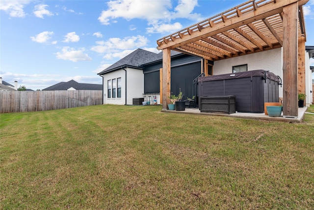 view of yard with central air condition unit, a pergola, and a hot tub