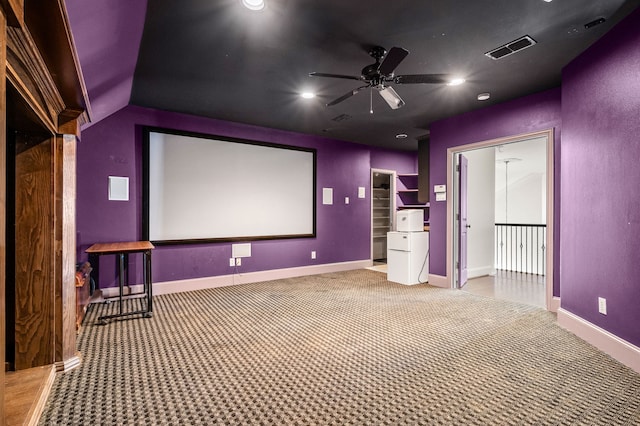 carpeted cinema with visible vents, recessed lighting, baseboards, and ceiling fan