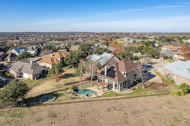 birds eye view of property with a residential view