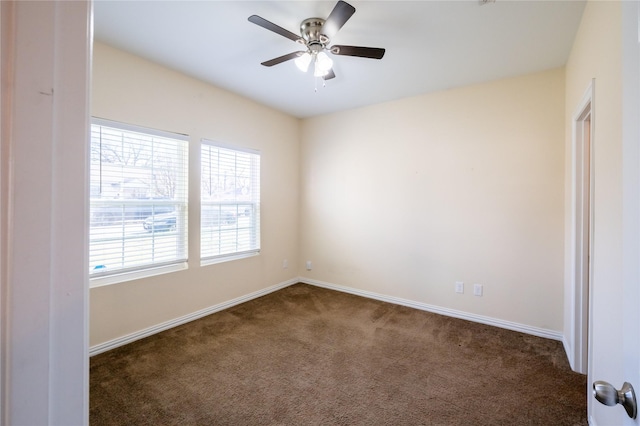 carpeted empty room with ceiling fan