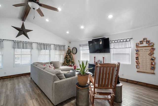 living room featuring hardwood / wood-style floors, a wealth of natural light, and ceiling fan