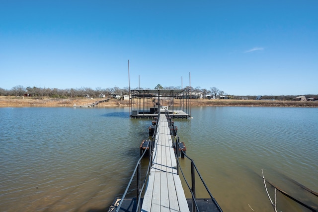 view of dock with a water view