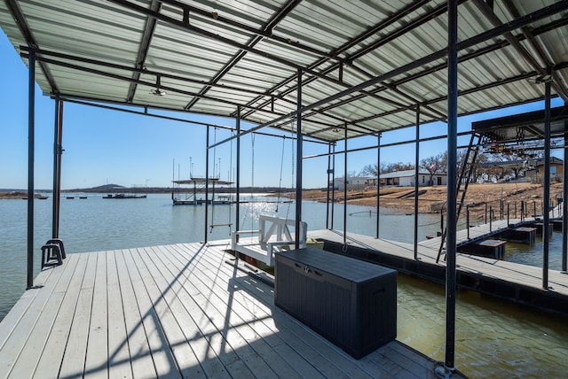 dock area featuring a water view