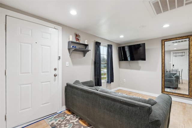 living room with hardwood / wood-style flooring