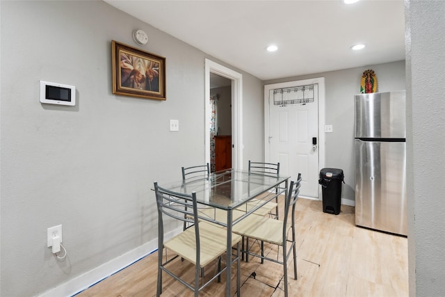 dining room featuring light wood-type flooring