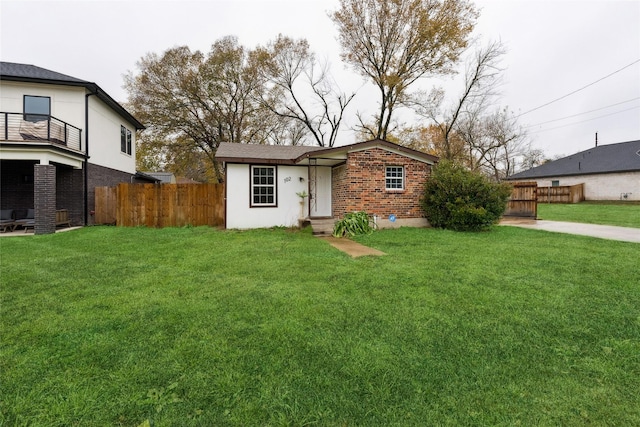 view of front of home with a front yard