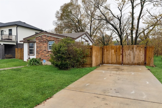 view of property exterior with a lawn