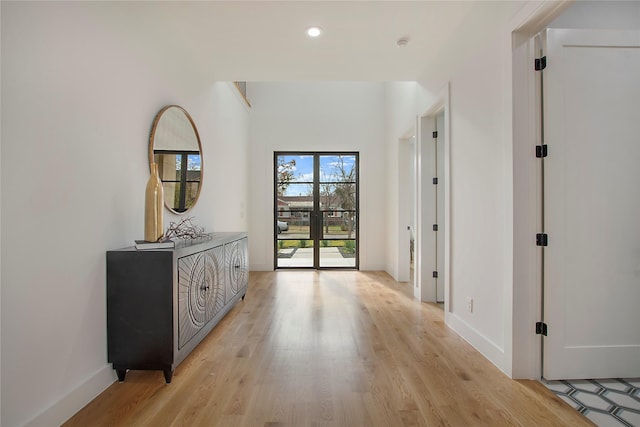 corridor featuring light hardwood / wood-style flooring