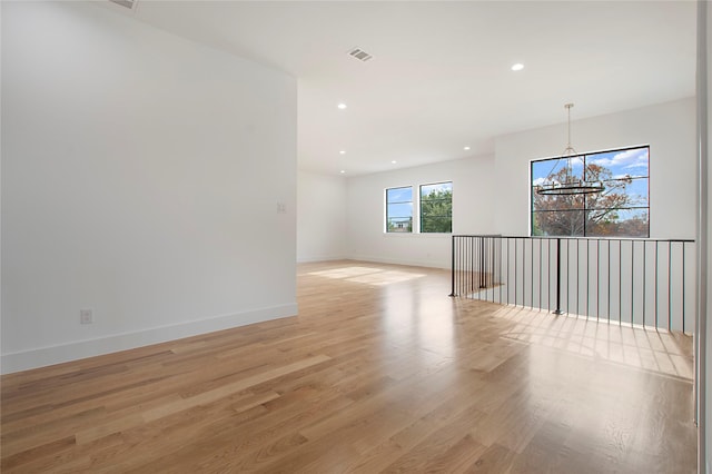 empty room with light wood-type flooring