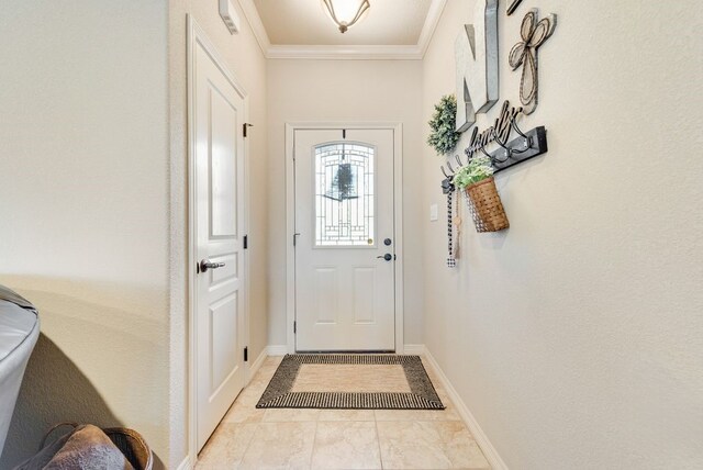 doorway to outside featuring ornamental molding