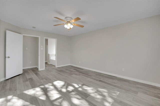 unfurnished bedroom featuring ceiling fan and light wood-type flooring