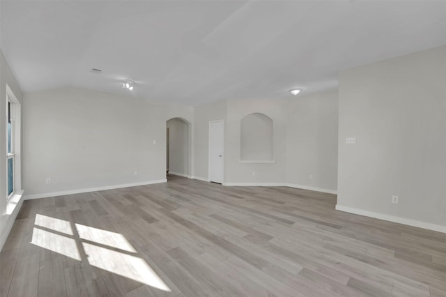 spare room with light wood-type flooring