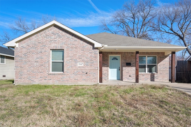 view of front of home featuring a front yard