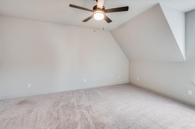 bonus room featuring carpet flooring, ceiling fan, and vaulted ceiling